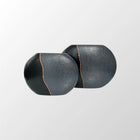 decorative flat ceramic vases styled on a modern console table
