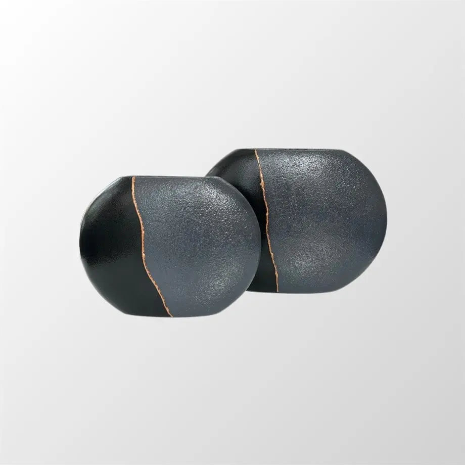decorative flat ceramic vases styled on a modern console table