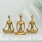 handmade gold candle holder set with sculptural decorative figures