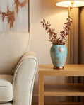 handmade turquoise ceramic vase with copper accents for modern interior decor