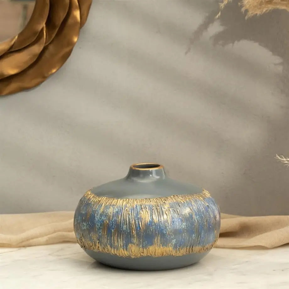 flat ceramic decorative vase styled on a modern console table