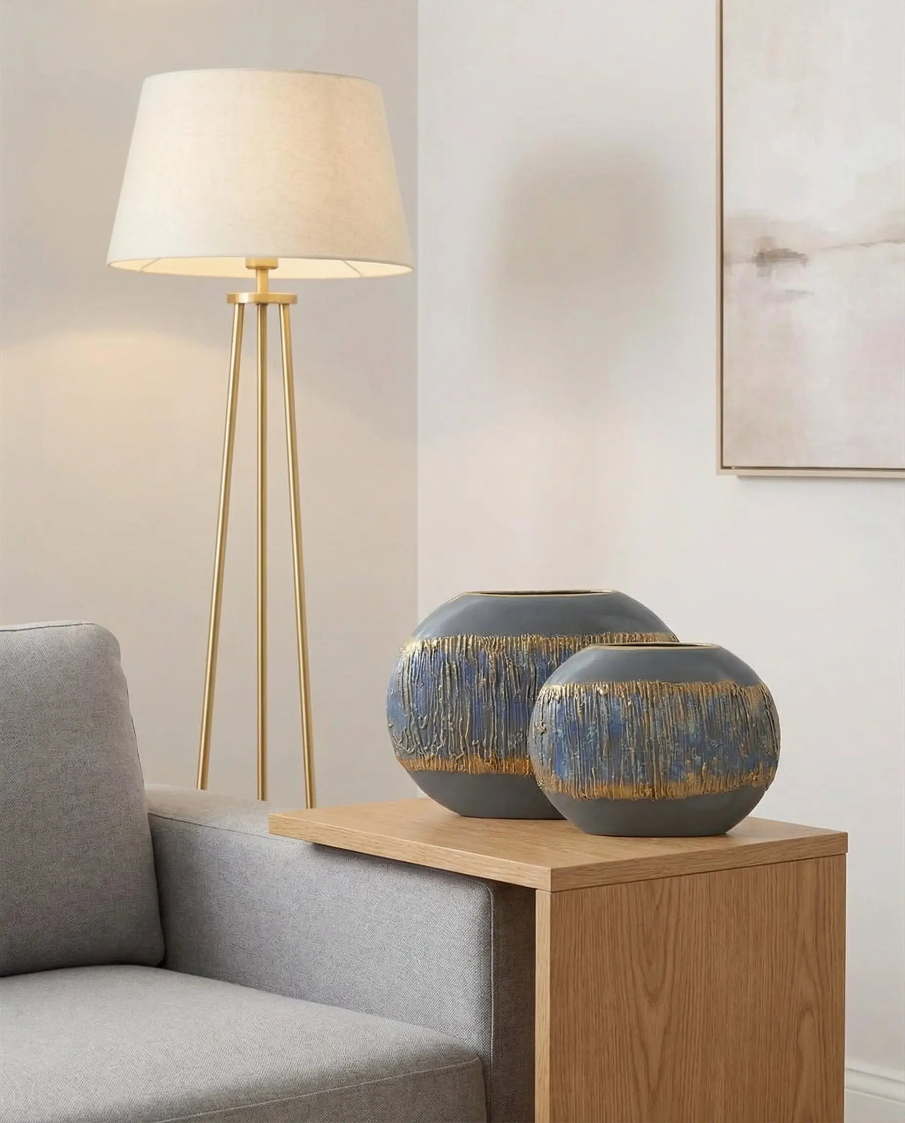 two piece flat ceramic vase set styled on a modern console table
