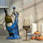 decorative sculptural wine holder styled on a dining table