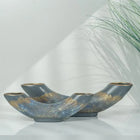 modern half moon shaped ceramic vases with gold accents for contemporary interiors