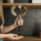 isis egyptian goddess decorative sculpture styled on a modern console table