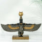 decorative egyptian goddess sculpture styled on a modern console table