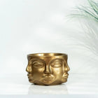 modern sculptural gold face planter for interior decor