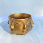 modern sculptural gold face planter for interior decor