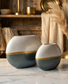 decorative green pearl ceramic vases styled on a modern console table