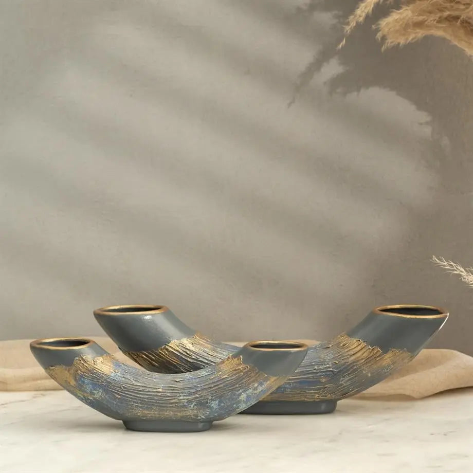 decorative half moon ceramic vases styled on a modern console table
