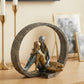 handmade circular sculptural decor object in anthracite gold and silver
