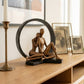 handmade circular sculptural decor object in black and copper for modern interiors