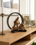 handmade circular sculptural decor object in black and copper for modern interiors
