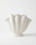 handmade white ceramic vase with sculptural seashell design for modern interiors