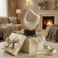 cream ceramic sculptural decor object styled on a modern shelf