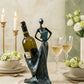 handmade petrol green woman wine holder sculpture holding a wine bottle