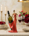 handmade pomegranate red woman wine holder sculpture holding a wine bottle