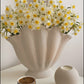 modern white ceramic decorative vase styled on a console table