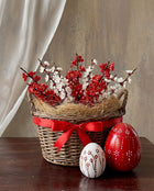 red ceramic easter egg decorations styled on a spring table
