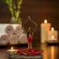 red yogini candle holder sculpture for meditation and yoga space decor