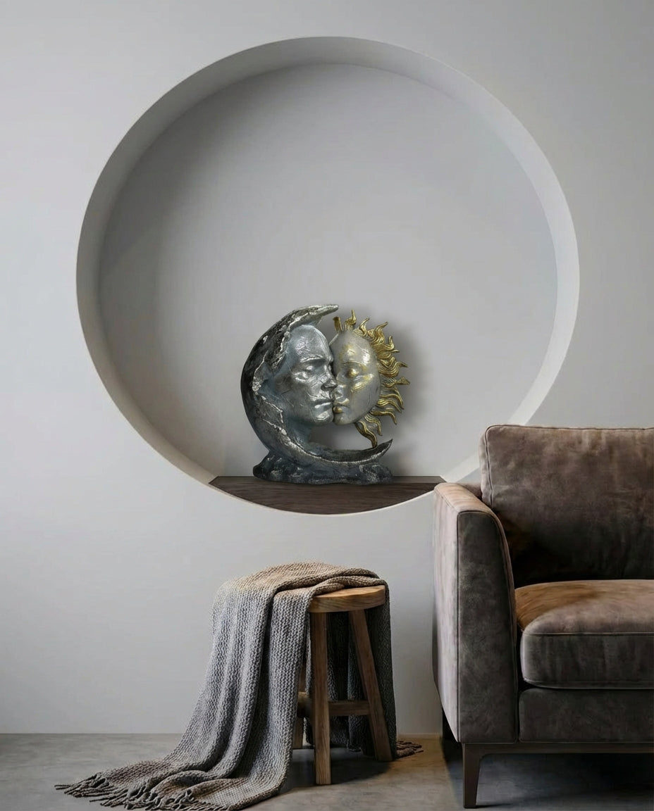 decorative sun and moon sculpture styled on a modern console table