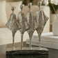 handmade silver abstract sculpture with four figures symbolising unity and balance