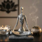 silver yoga woman decorative sculpture styled on a modern console table