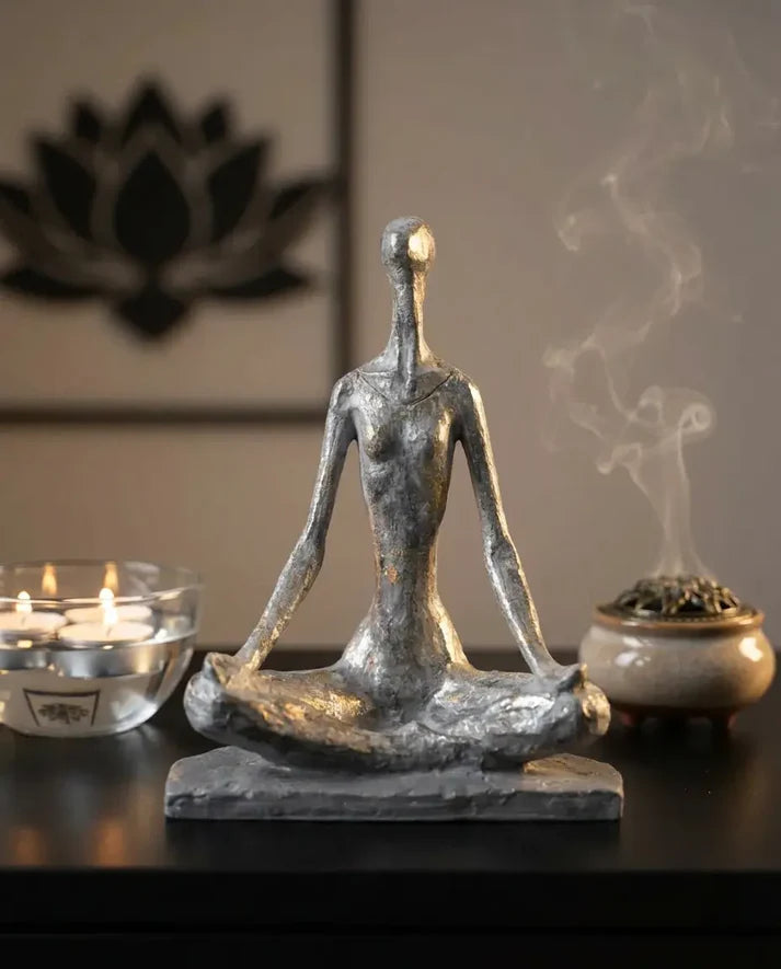silver yoga woman decorative sculpture styled on a modern console table