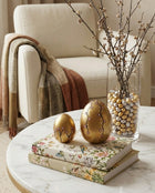 handmade gold ceramic eggs used for spring seasonal home decor