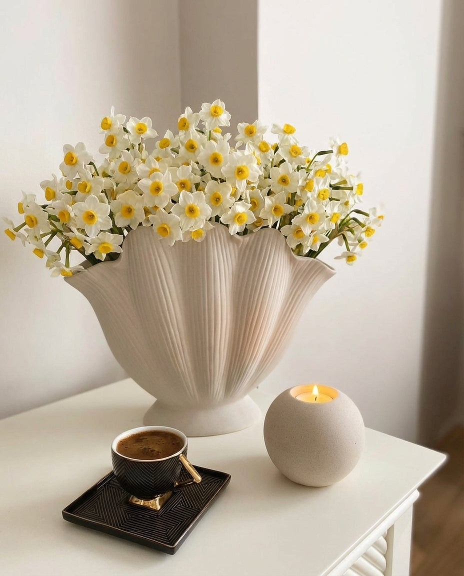 modern white ceramic decorative vase styled on a console table